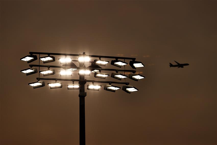 Bronze sunset and floodlights