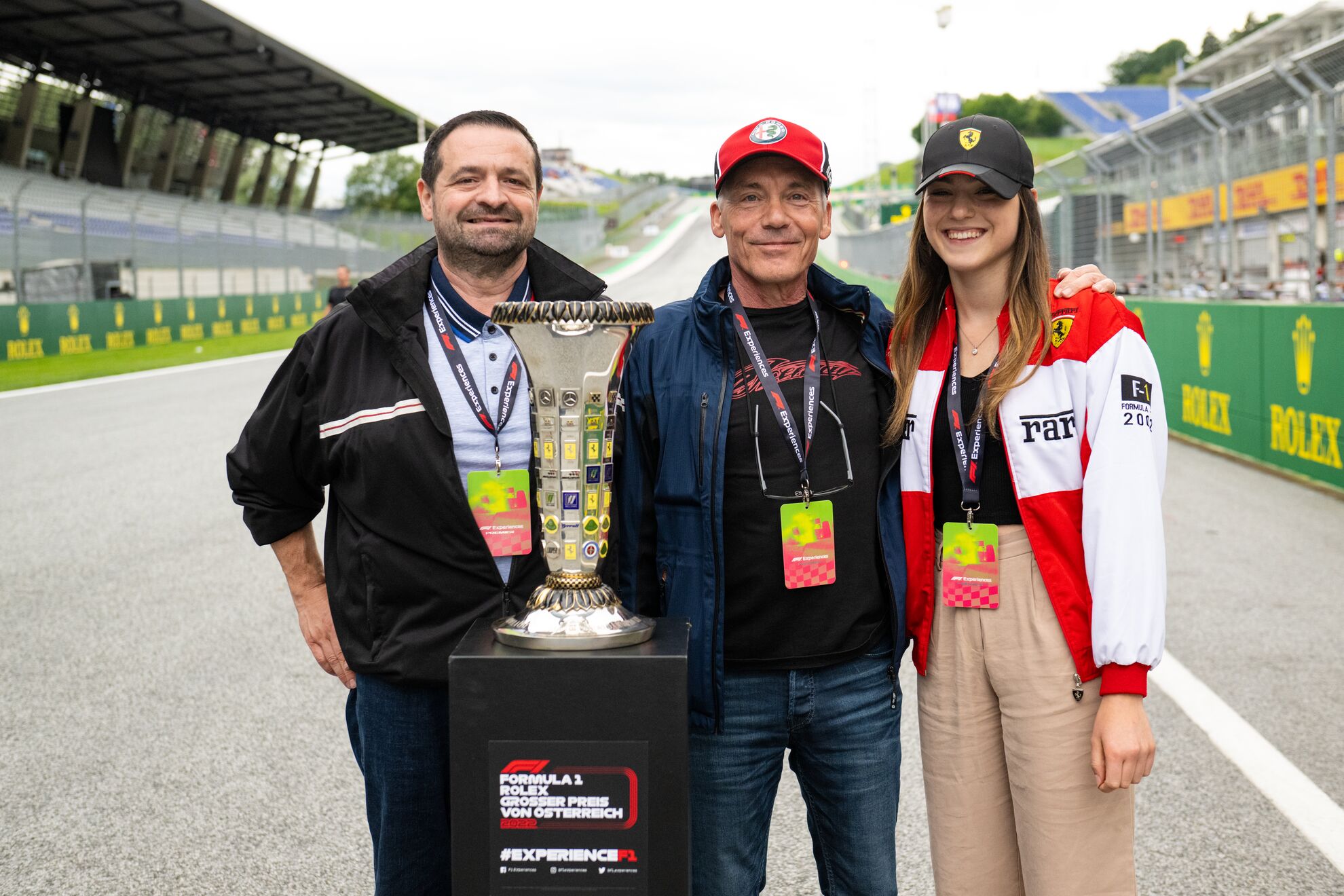 F1 fans around trophy