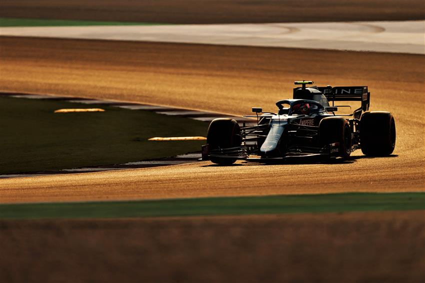 F1 car on a sunset race track