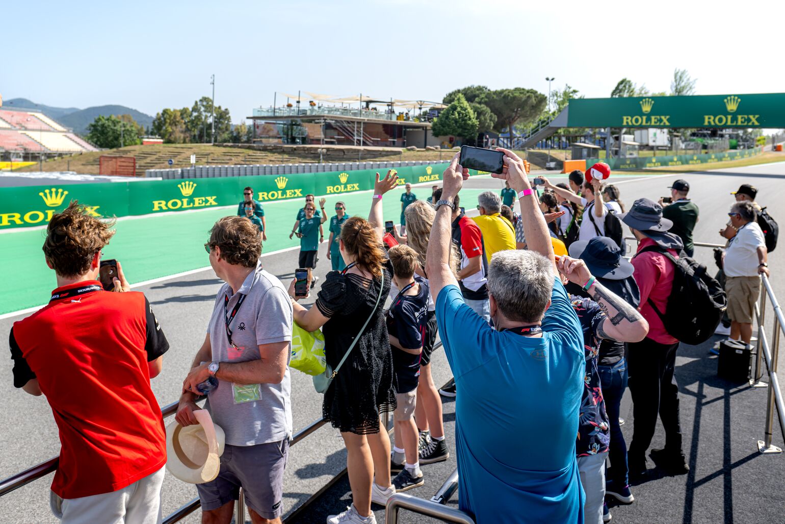 Race fans taking photos