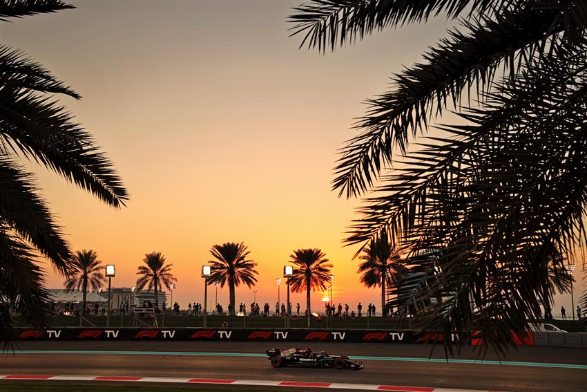 Peach sky f1 cars palm trees