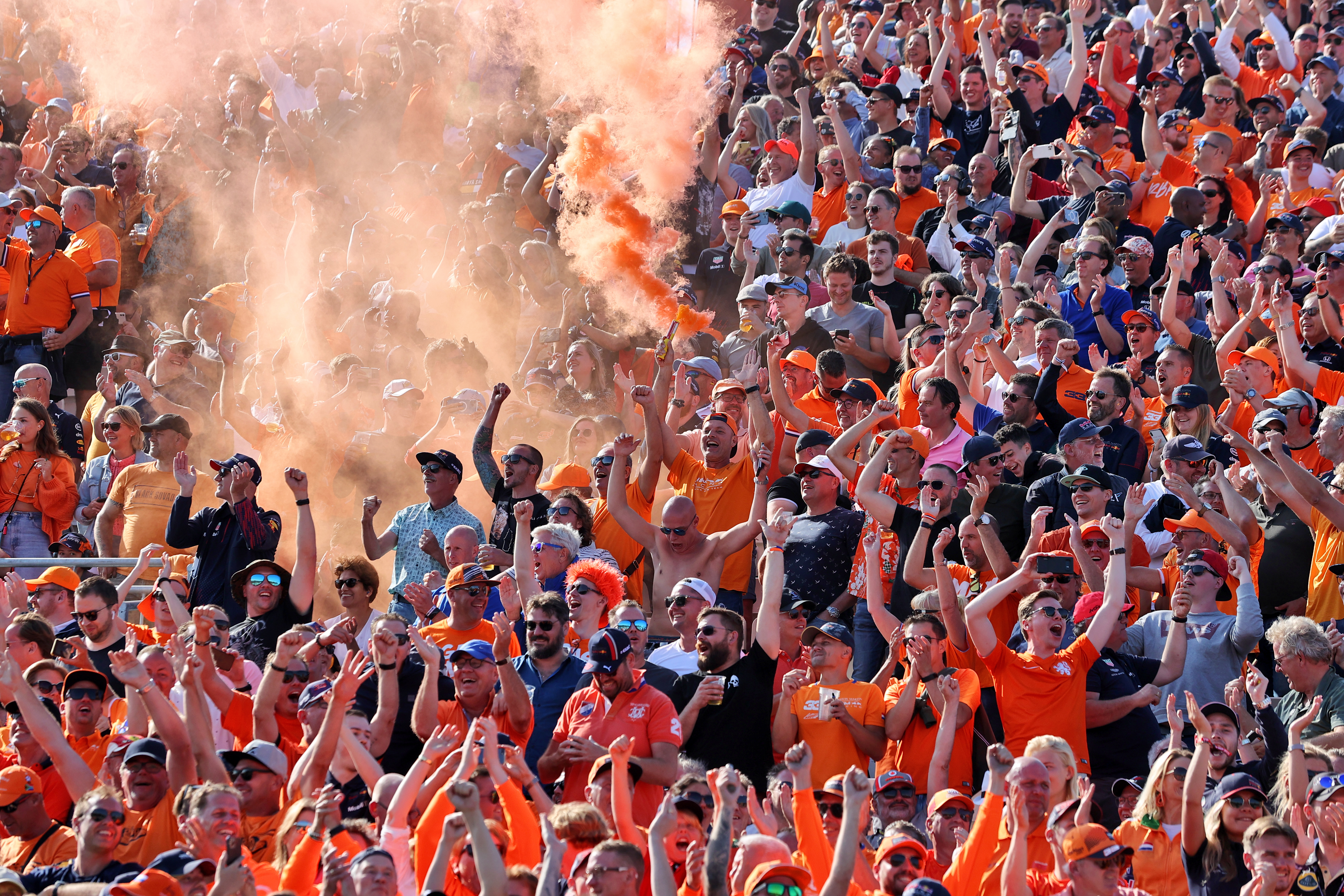 Orange smoke and fans